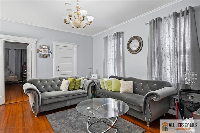 435 Ashley St, Perth Amboy, NJ 08861 - living room with a chandelier, wood finished floors, ornamental molding, and a baseboard radiator