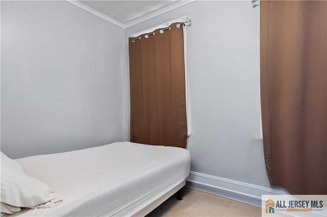 435 Ashley St, Perth Amboy, NJ 08861 - bedroom with baseboards and ornamental molding