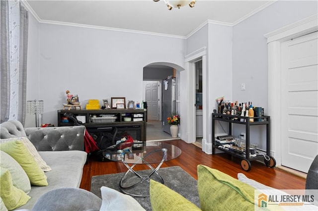 435 Ashley St, Perth Amboy, NJ 08861 - living area featuring arched walkways, wood finished floors, and crown molding