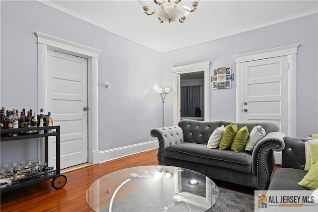 435 Ashley St, Perth Amboy, NJ 08861 - living room featuring wood finished floors, crown molding, and a chandelier