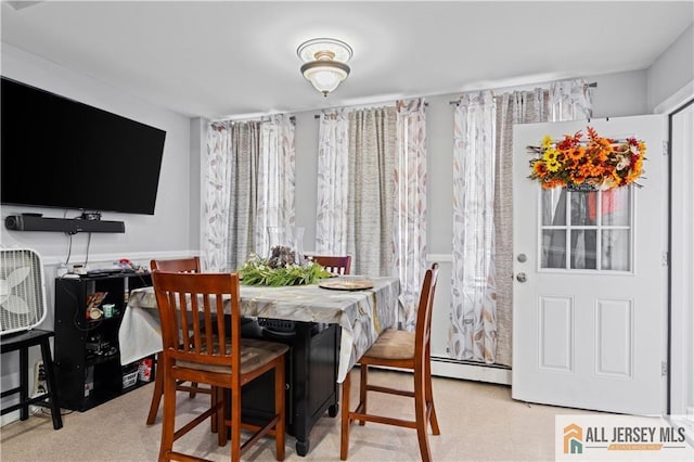 435 Ashley St, Perth Amboy, NJ 08861 - dining space featuring a baseboard radiator