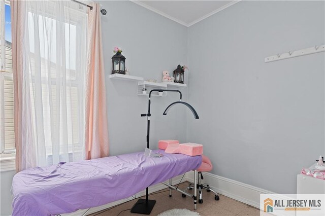435 Ashley St, Perth Amboy, NJ 08861 - bedroom with crown molding and baseboards