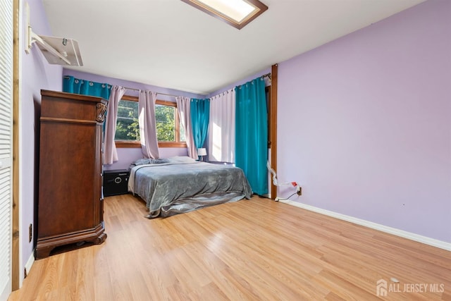 bedroom featuring hardwood / wood-style floors