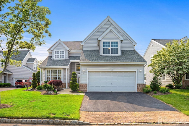 3 Devon Ct, Monroe, NJ 08831 - traditional-style house featuring driveway, a shingled roof, and a front yard