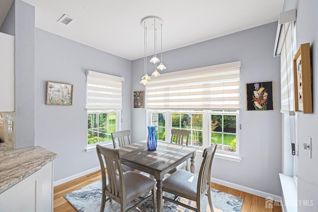 3 Devon Ct, Monroe, NJ 08831 - dining area with baseboards and light wood-style floors