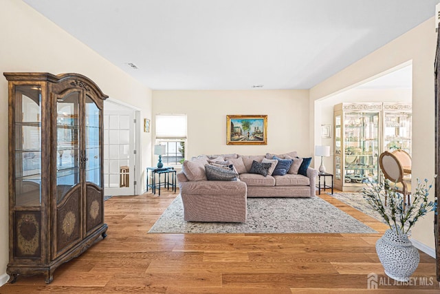 3 Devon Ct, Monroe, NJ 08831 - living area featuring light wood-style floors and french doors