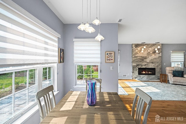 3 Devon Ct, Monroe, NJ 08831 - dining area featuring wood finished floors and a large fireplace