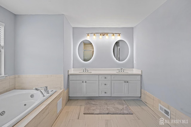 3 Devon Ct, Monroe, NJ 08831 - bathroom with double vanity and a tub with jets