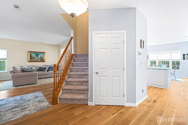 3 Devon Ct, Monroe, NJ 08831 - stairway with wood finished floors and baseboards