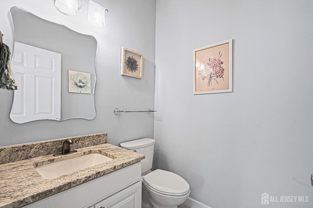 3 Devon Ct, Monroe, NJ 08831 - bathroom featuring toilet, vanity, and baseboards
