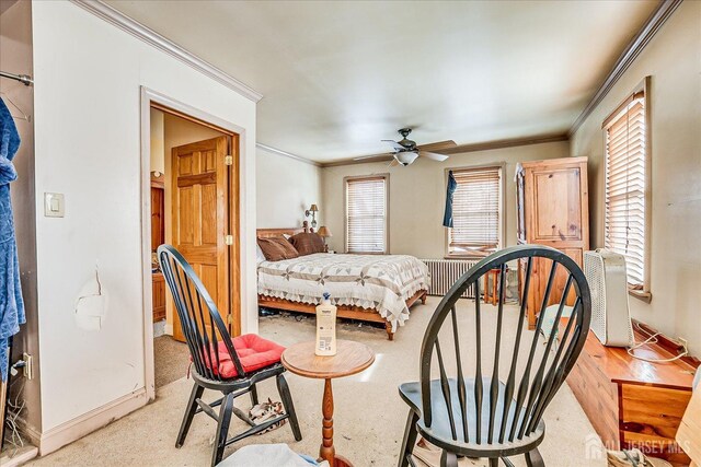 bedroom featuring crown molding and ceiling fan