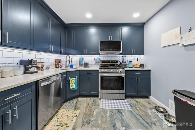 6 Amethyst Way, Franklin Twsp, NJ 08823 - kitchen with stainless steel appliances, a sink, backsplash, and light wood finished floors