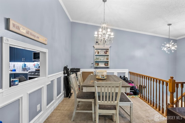 6 Amethyst Way, Franklin Twsp, NJ 08823 - dining area featuring a chandelier, crown molding, light carpet, and wainscoting