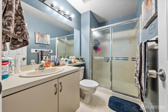 6 Amethyst Way, Franklin Twsp, NJ 08823 - full bath with vanity, toilet, a shower stall, and tile patterned flooring