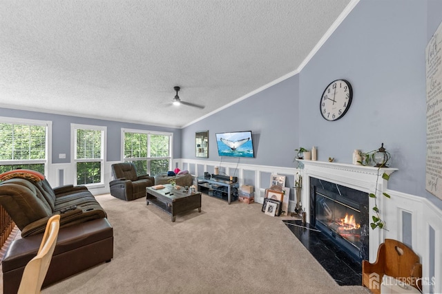 6 Amethyst Way, Franklin Twsp, NJ 08823 - living area with lofted ceiling, a textured ceiling, ornamental molding, a premium fireplace, and a ceiling fan