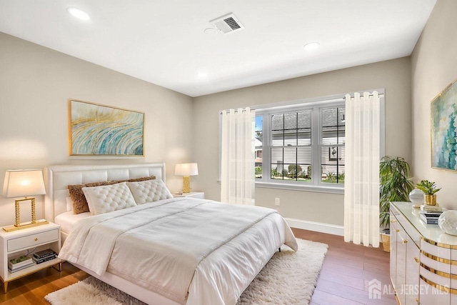 495 Newport Way Unit B, Monroe, NJ 08831 - bedroom with visible vents, baseboards, wood finished floors, and recessed lighting