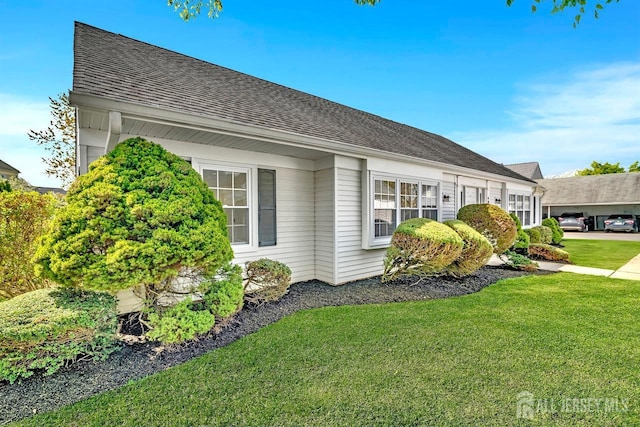 495 Newport Way Unit B, Monroe, NJ 08831 - view of side of home with a yard and roof with shingles