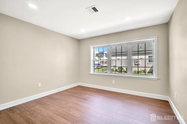 495 Newport Way Unit B, Monroe, NJ 08831 - unfurnished room with wood finished floors and recessed lighting