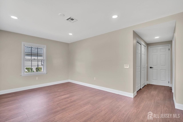 495 Newport Way Unit B, Monroe, NJ 08831 - spare room with wood finished floors and recessed lighting