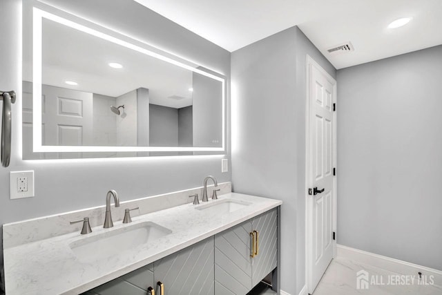 495 Newport Way Unit B, Monroe, NJ 08831 - full bathroom featuring marble finish floor, baseboards, a sink, and visible vents