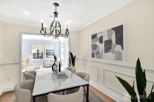 495 Newport Way Unit B, Monroe, NJ 08831 - dining area with visible vents, an inviting chandelier, recessed lighting, wood finished floors, and crown molding