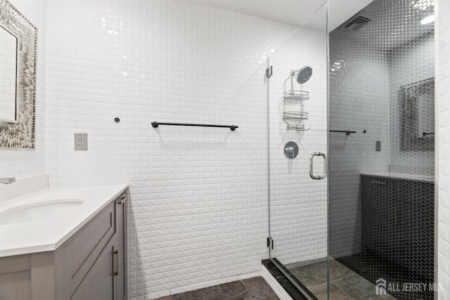 6 Allison Ct, Edison, NJ 08820 - bathroom with vanity, a shower stall, and tile walls