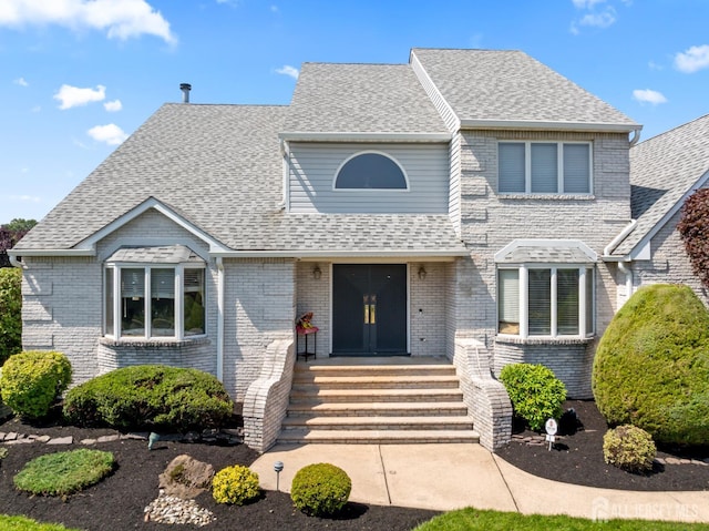 6 Allison Ct, Edison, NJ 08820 - shingle-style home featuring brick siding and roof with shingles