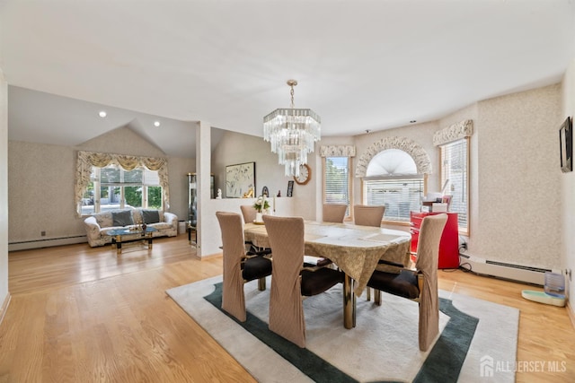 6 Allison Ct, Edison, NJ 08820 - dining space featuring a baseboard heating unit, light wood-style floors, and lofted ceiling