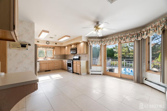 6 Allison Ct, Edison, NJ 08820 - kitchen featuring stainless steel appliances, light brown cabinetry, a baseboard radiator, light countertops, and a sink