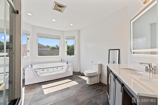 6 Allison Ct, Edison, NJ 08820 - full bath featuring vanity, a whirlpool tub, toilet, a stall shower, and recessed lighting