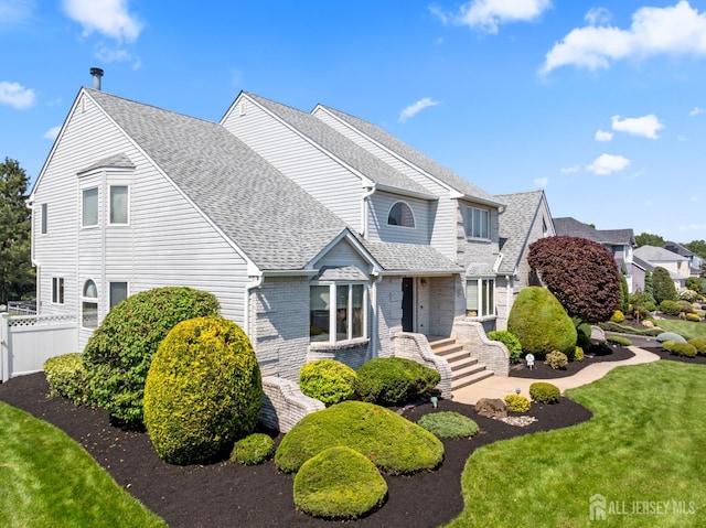 6 Allison Ct, Edison, NJ 08820 - view of side of property with roof with shingles and brick siding