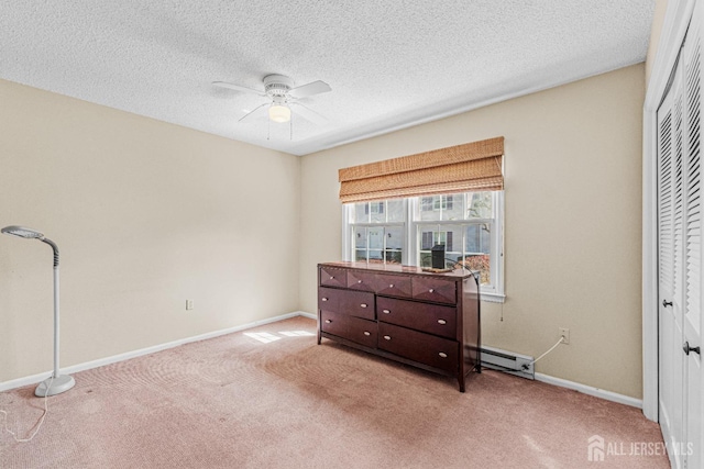 195 Mayflower Way Unit B, Monroe, NJ 08831 - carpeted bedroom with baseboards, a ceiling fan, a closet, and a textured ceiling