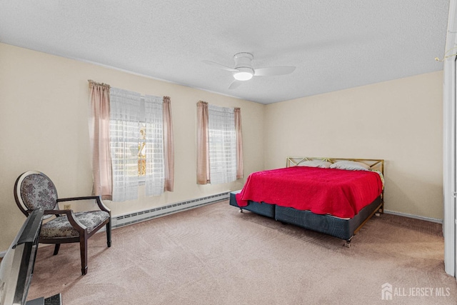 195 Mayflower Way Unit B, Monroe, NJ 08831 - bedroom featuring a ceiling fan, carpet, a baseboard heating unit, and a textured ceiling