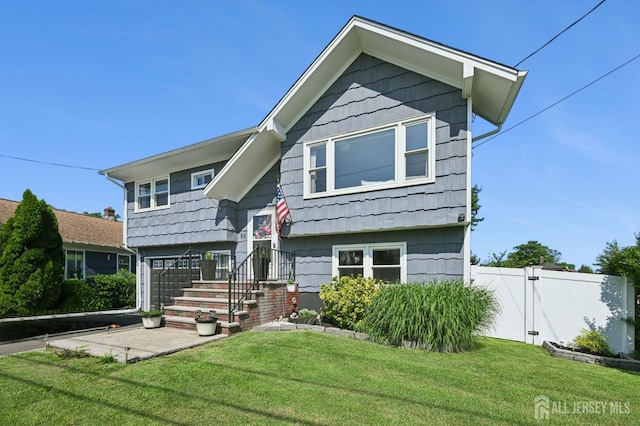 56 3rd Ave, Port Reading, NJ 07064 - split foyer home with a gate