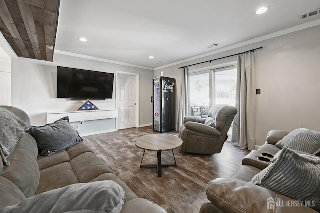 56 3rd Ave, Port Reading, NJ 07064 - living room featuring wood finished floors, recessed lighting, and ornamental molding