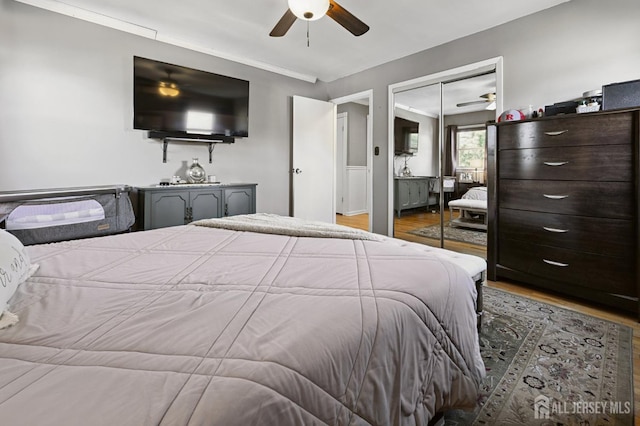 56 3rd Ave, Port Reading, NJ 07064 - bedroom featuring wood finished floors, ceiling fan, and a closet