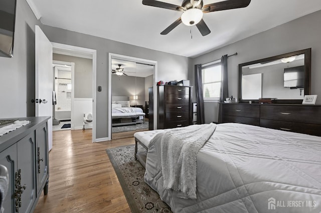 56 3rd Ave, Port Reading, NJ 07064 - bedroom with wood finished floors, a closet, and ceiling fan