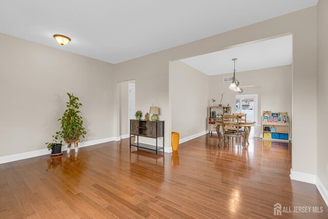 51 N Smith St, Avenel, NJ 07001 - dining room featuring wood finished floors and baseboards