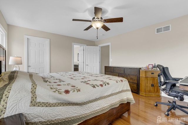51 N Smith St, Avenel, NJ 07001 - bedroom with light wood-style floors, ceiling fan, and an office area