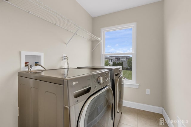 51 N Smith St, Avenel, NJ 07001 - washroom featuring washing machine and clothes dryer and light tile patterned floors