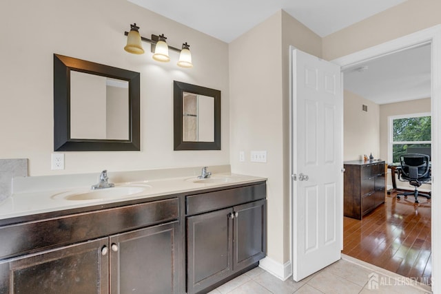 51 N Smith St, Avenel, NJ 07001 - full bathroom with double vanity and tile patterned flooring