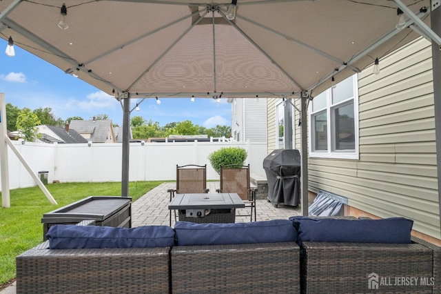 51 N Smith St, Avenel, NJ 07001 - fenced backyard with an outdoor living space, area for grilling, a patio area, and a gazebo
