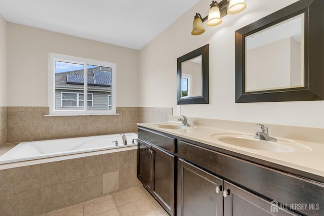 51 N Smith St, Avenel, NJ 07001 - full bathroom featuring double vanity, a bath, and tile patterned flooring
