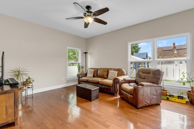 51 N Smith St, Avenel, NJ 07001 - living area with plenty of natural light, hardwood / wood-style floors, and a ceiling fan