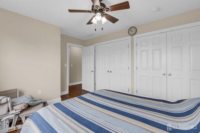 51 N Smith St, Avenel, NJ 07001 - bedroom featuring two closets, ceiling fan, and dark wood finished floors