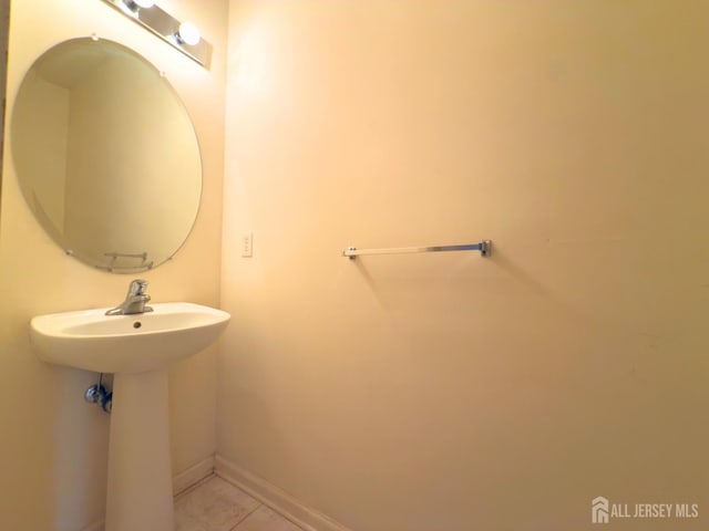 315 Birch Ct, New Brunswick, NJ 08901 - bathroom featuring baseboards and tile patterned flooring