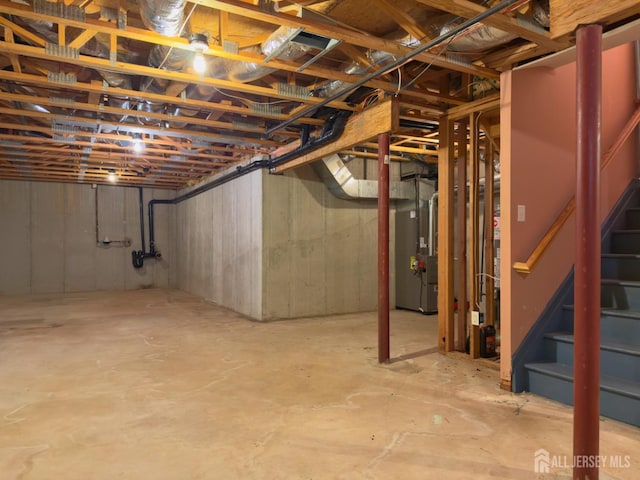 315 Birch Ct, New Brunswick, NJ 08901 - unfinished basement with heating unit and stairway