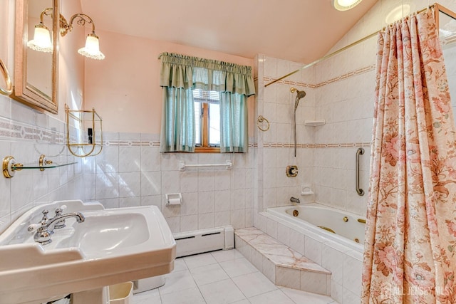 79 S Hill Rd, Colonia, NJ 07067 - bathroom featuring a baseboard radiator, tiled shower / bath combo, tile walls, a sink, and tile patterned flooring