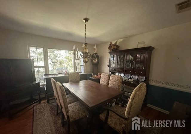 188 N Rd, Chester Twp, NJ 07930 - dining room featuring a chandelier and wood finished floors