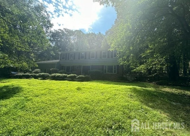 188 N Rd, Chester Twp, NJ 07930 - rear view of house featuring a yard